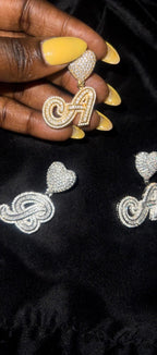Gold B pendant close-up