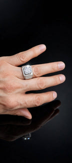 The Sovereign ring worn on hand