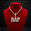 Talk That Talk custom iced-out RAP pendant on red velvet jewelry bust
