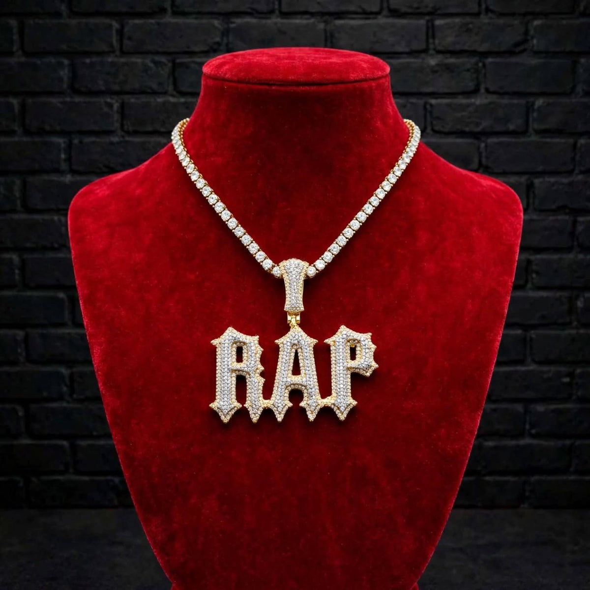Talk That Talk custom iced-out RAP pendant on red velvet jewelry bust