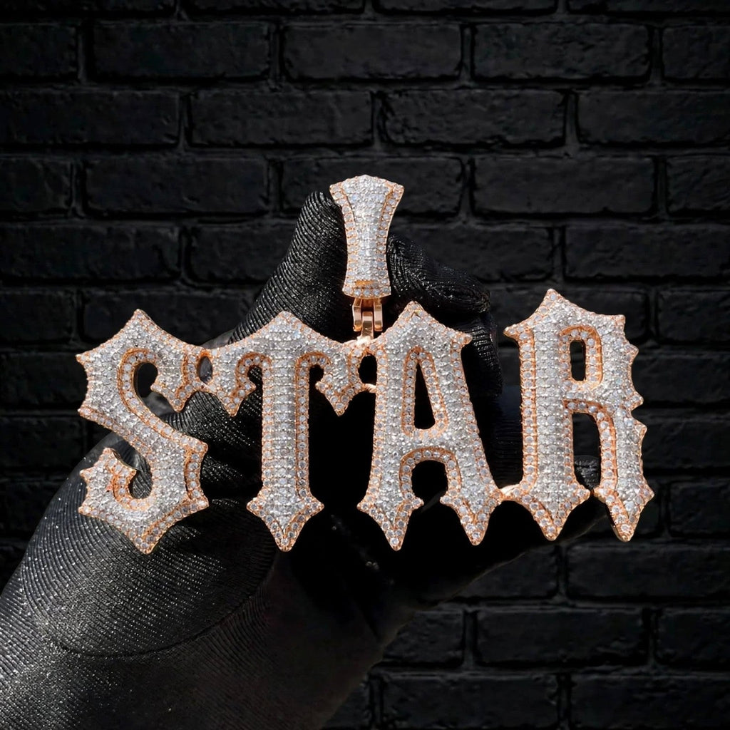 Talk That Talk custom iced-out STAR pendant held on black glove