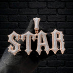 Talk That Talk custom iced-out STAR pendant held on black glove