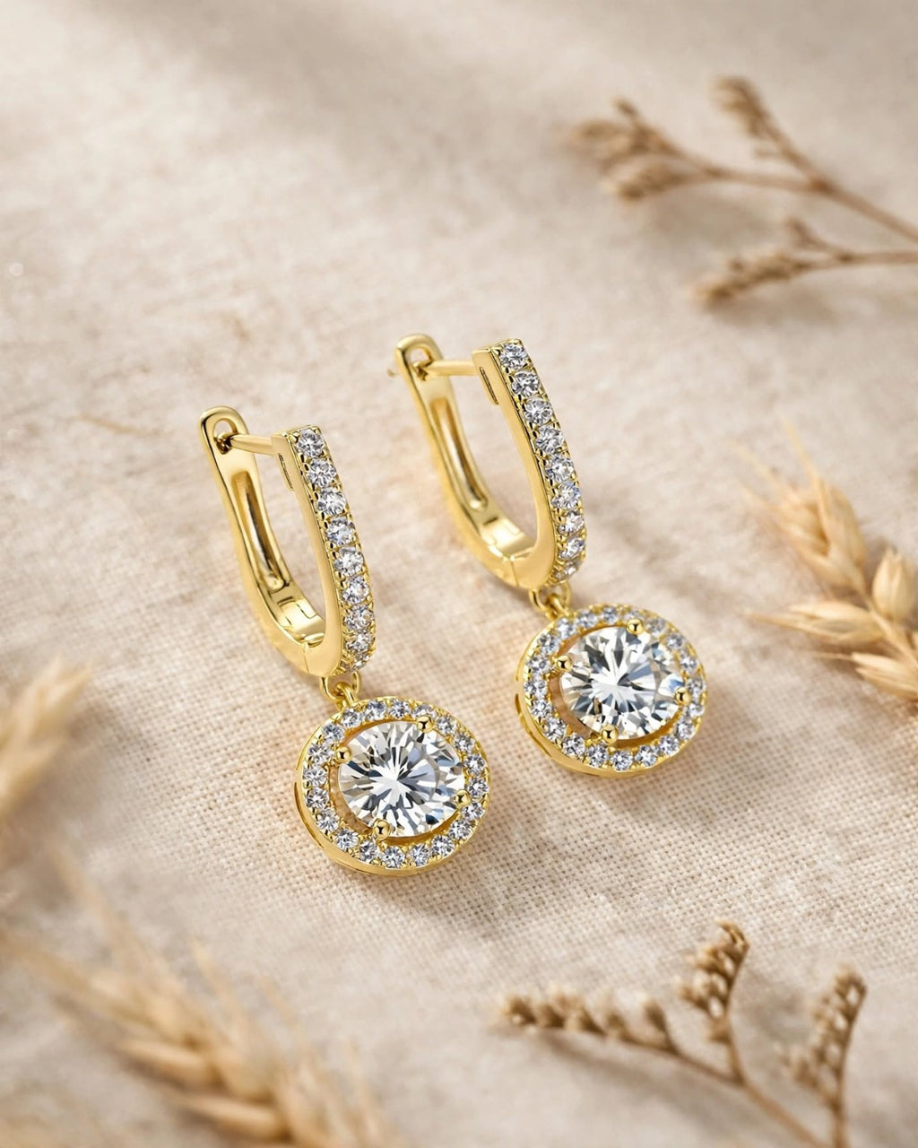 Pair of gold-tone moissanite dangle earrings