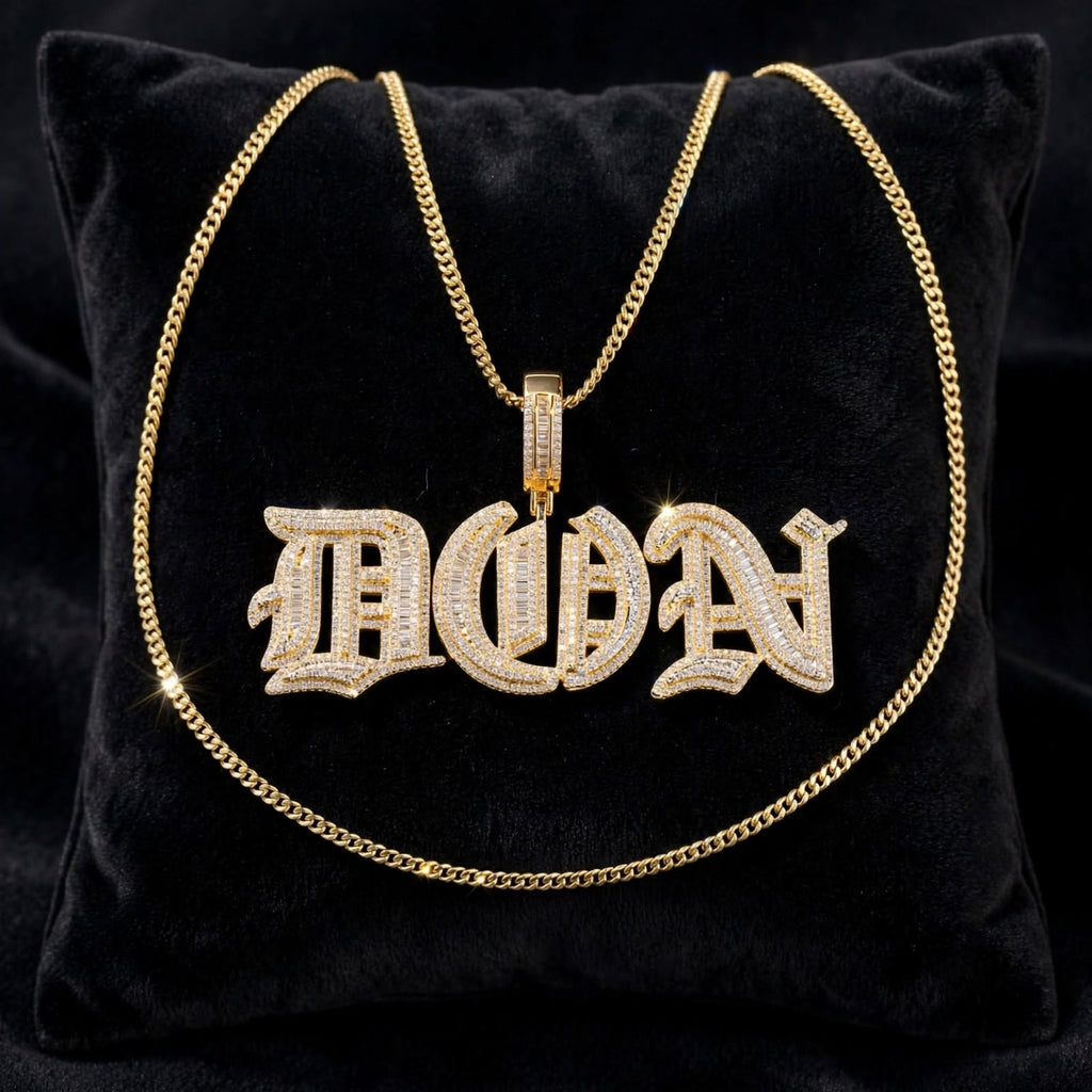 Gold Old English DON custom pendant with chain displayed on black velvet