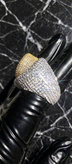 The Introduction silver iced-out ring profile with gold ring behind