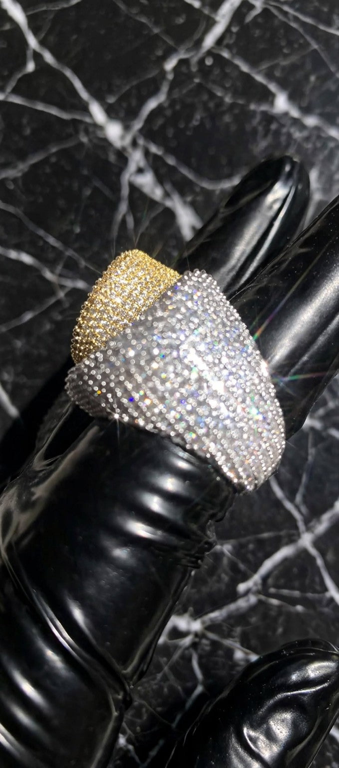 The Introduction silver iced-out ring profile with gold ring behind