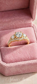 Yellow gold-filled three-stone halo ring in pink velvet box