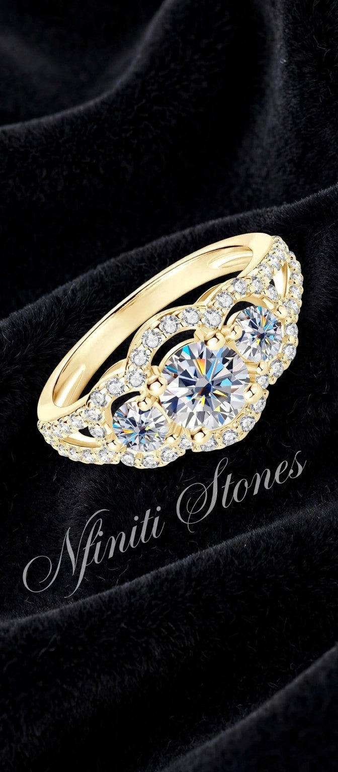 Yellow gold-filled three-stone halo ring on black velvet