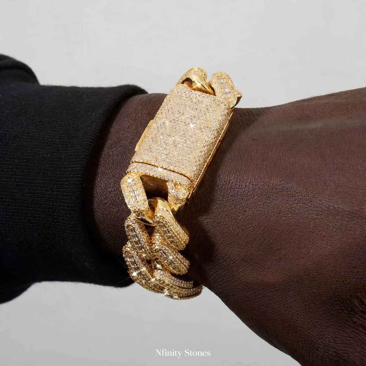 The Warlord 28mm Gold Cuban bracelet worn on wrist